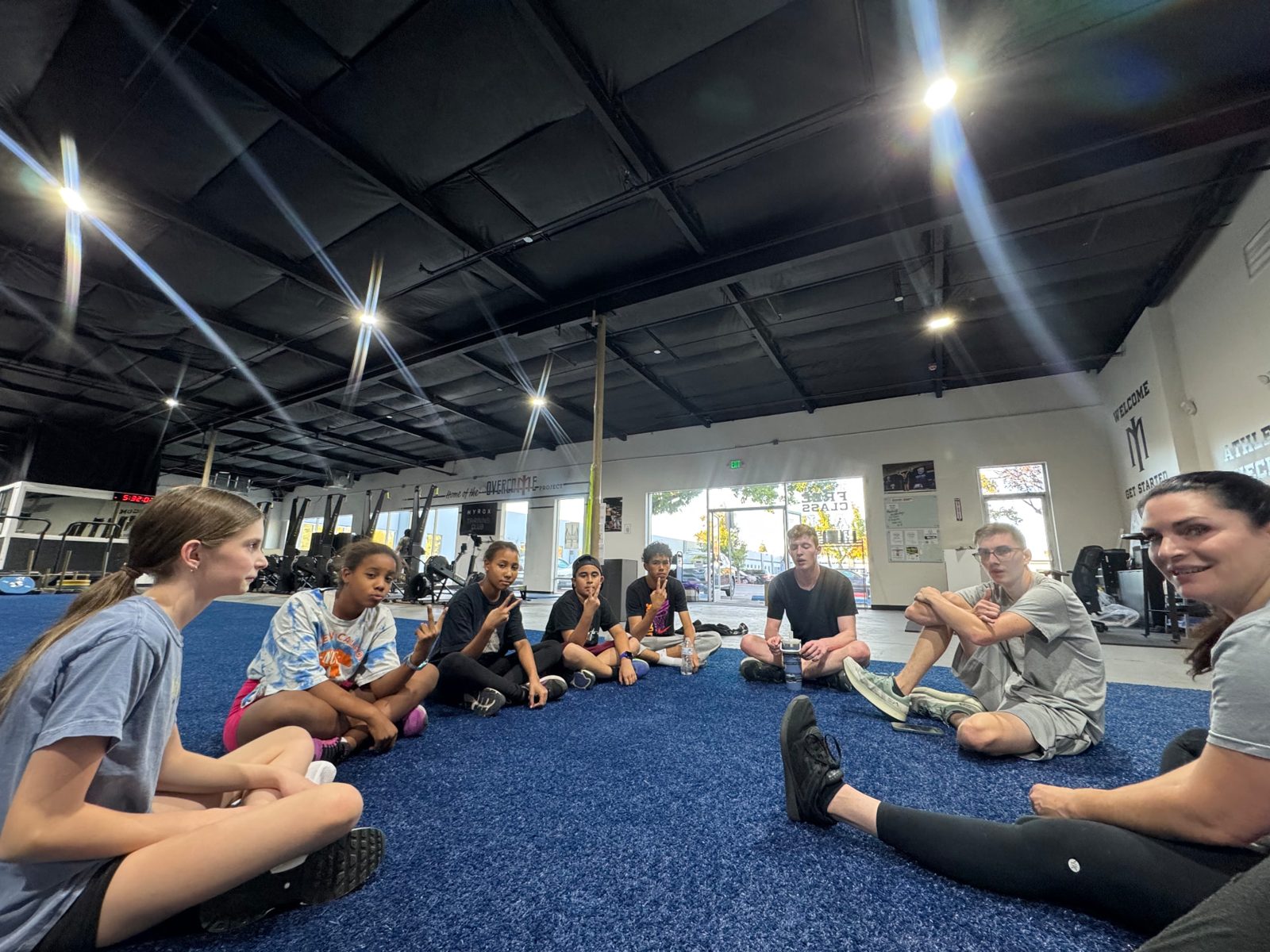 Kids and parents stretching together